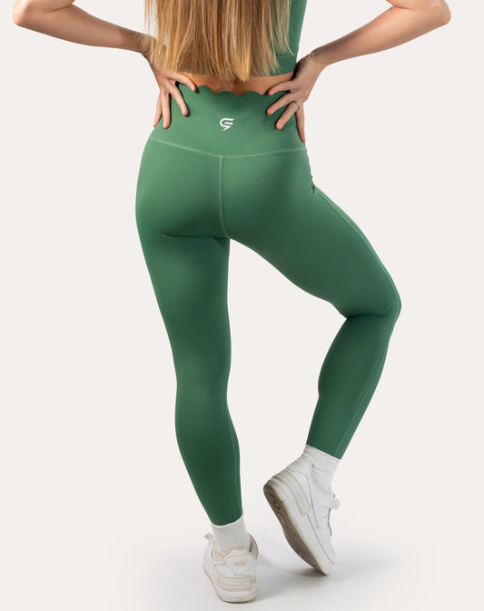 Green leggings with scallop high-waist; back left three quarter view