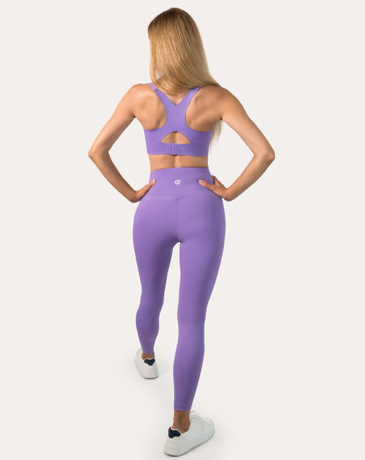 Back view of lilac gym set showing racerback keyhole bra and high-waist leggings