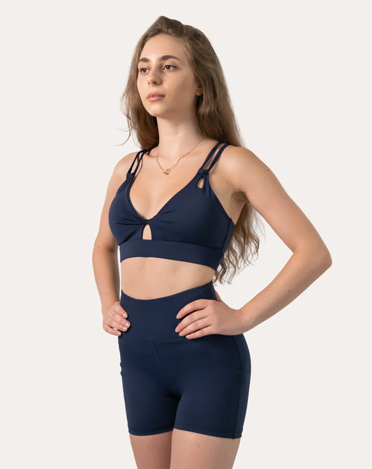 Full-body front view of navy sports shorts with high waist and squat-proof coverage