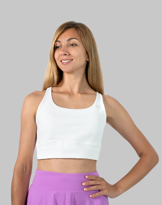 Straight front view of white medium support sports bra with scoop neckline and longline band