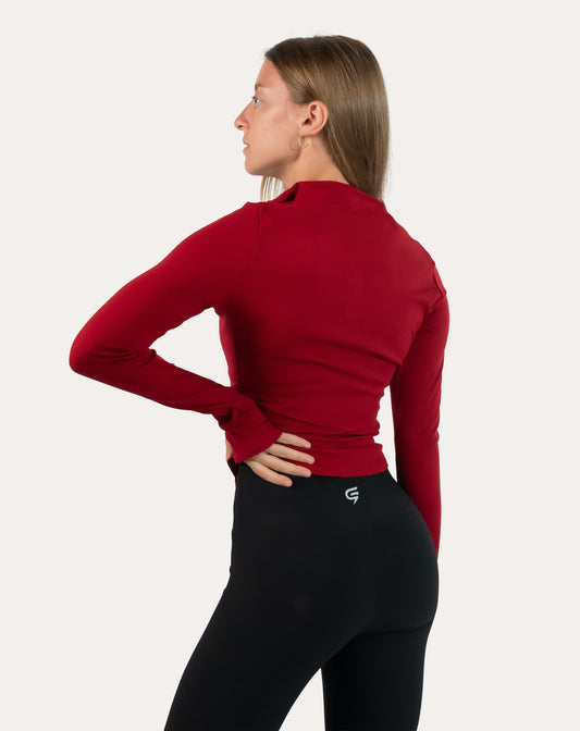 Crimson running jacket for women, full zip-up shown from the back right three-quarter view