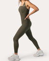 Right-side profile of olive athletic jumpsuit for women highlighting streamlined leg and hip