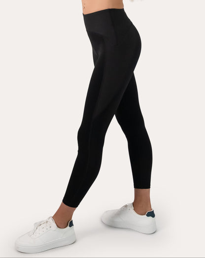 Black gym leggings with high-waist, 7/8 length; left three quarter view
