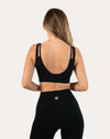 Back view of black high support sports bra with deep U and adjustable hook-and-eye closure
