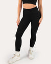 Black ribbed leggings with seamless high-rise waistband; front cropped waist-to-ankle view
