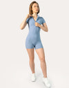 Blue sports jumpsuit in sky blue with short sleeves and zip front; front view, shorts length