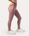 Side view showing sculpt fit, low-chafe seams, and buttery-soft feel of women’s mauve high-waisted leggings