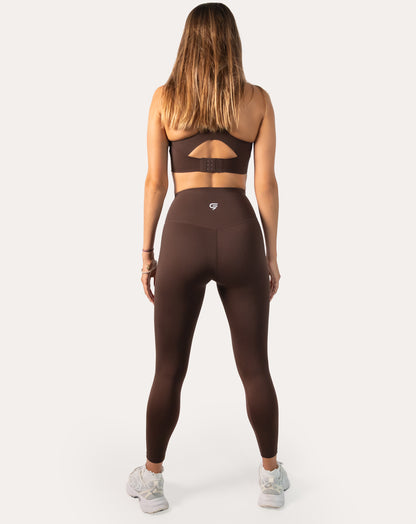 Chocolate brown sports leggings with high-rise waistband; back full-length view
