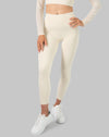 Front close-up of cream long sleeve gym set leggings highlighting the wide stay-put waistband