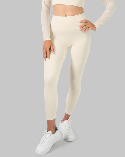 Front close-up of cream long sleeve gym set leggings highlighting the wide stay-put waistband