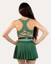 Back view of the forest green longline sports bra highlighting the strappy open back with racer-inspired keyholes