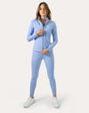 Blue gym set layered with matching zip jacket, front view