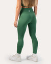 Green leggings with scallop high-waist; straight back view