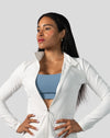 Arctic white gym jacket for women, right three-quarter stance, hands on hips