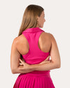 Back view of hot pink gym set highlighting racerback collared tank.