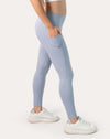 Right side angle with hand in the side phone pocket on ice blue high-waist leggings