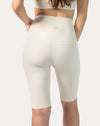 Back three-quarter right view of ivory longline bike shorts with supportive waistband