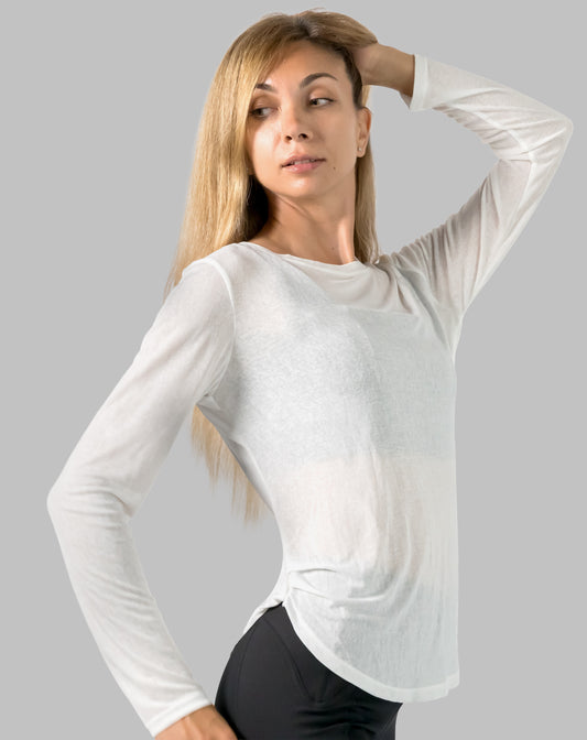 White ladies long sleeve gym top, front close-up with arm raised showing sheer crew neck