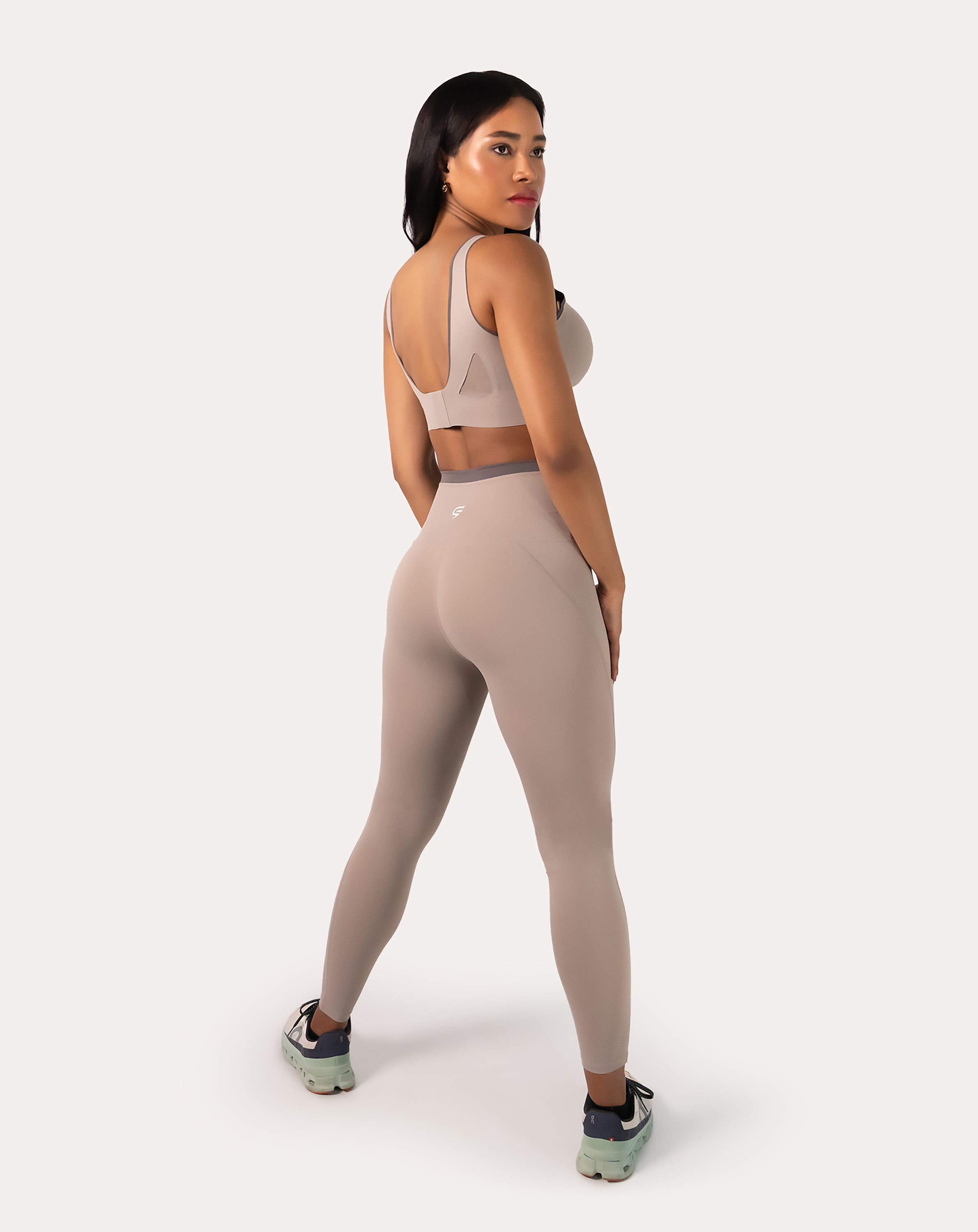 3/4 back view of light grey gym set with clasp-back scoop bra and minimal seams