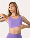 Lilac gym set sports bra close-up: scoop-neck, longline design with smooth, breathable fabric