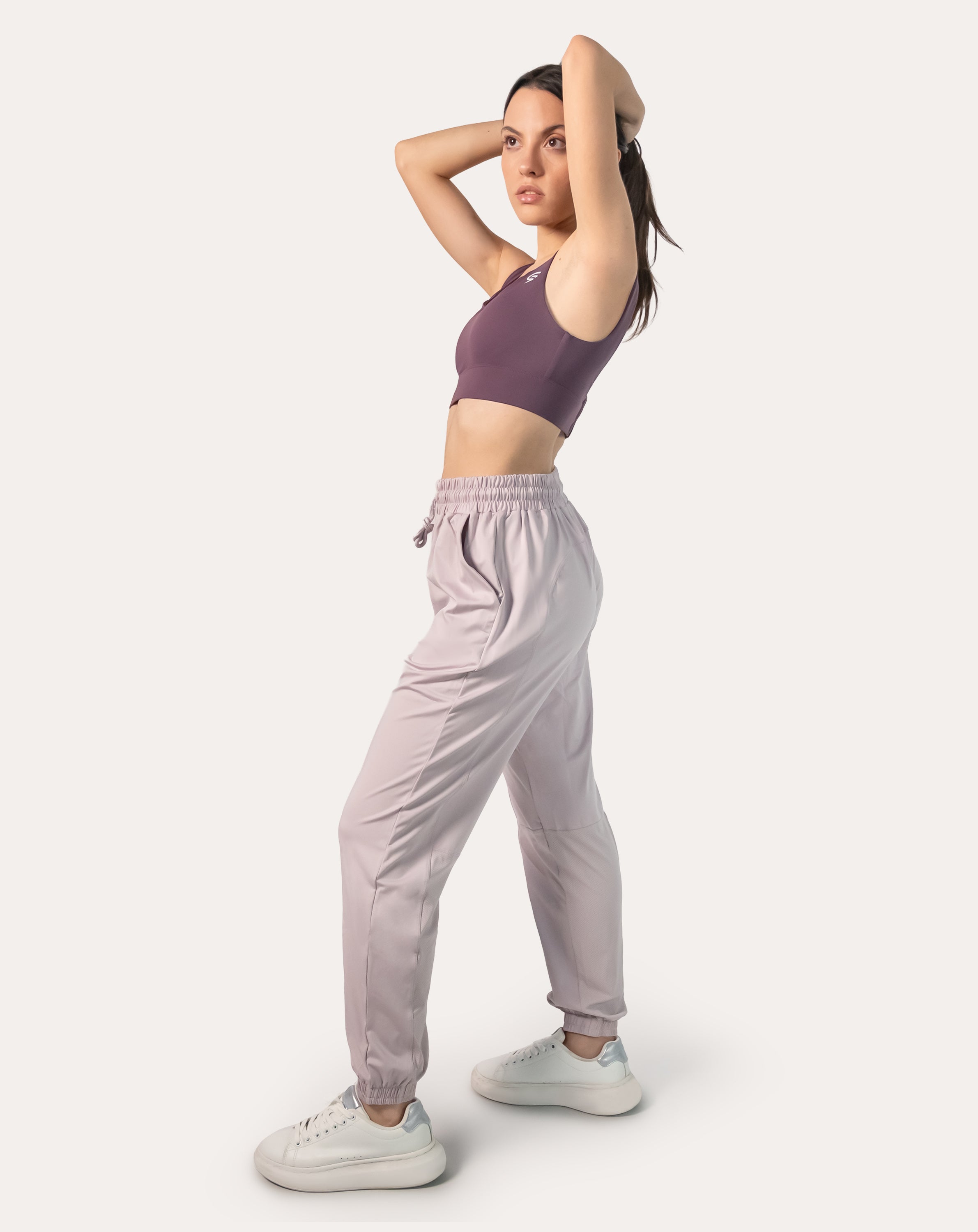 Lilac joggers for women, right three-quarter view highlighting side pocket and tapered fit