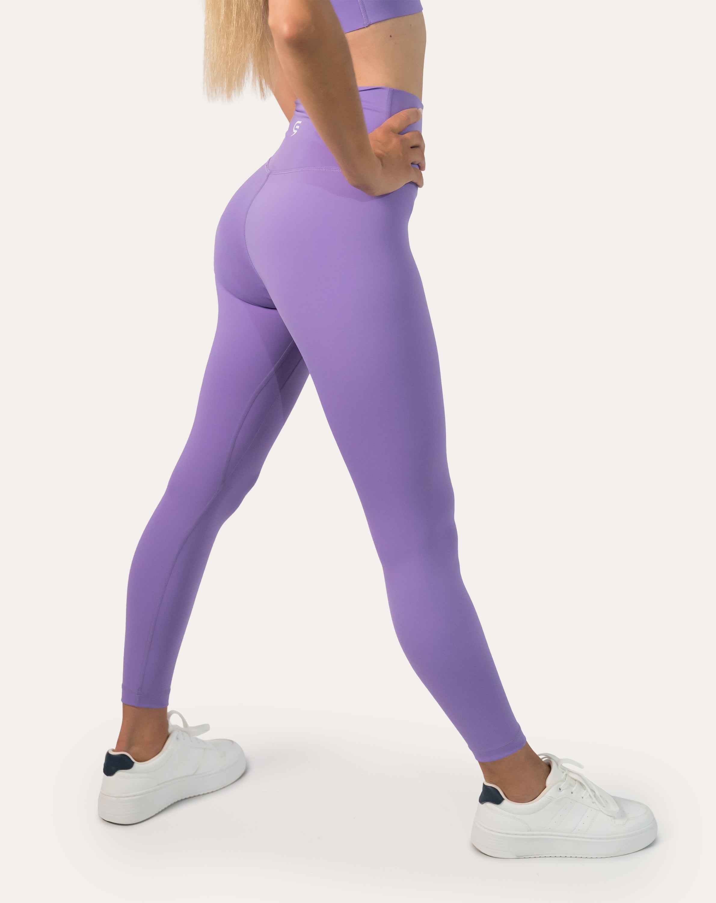 Lilac Pilates leggings with high-waist, ankle length; back three quarter view