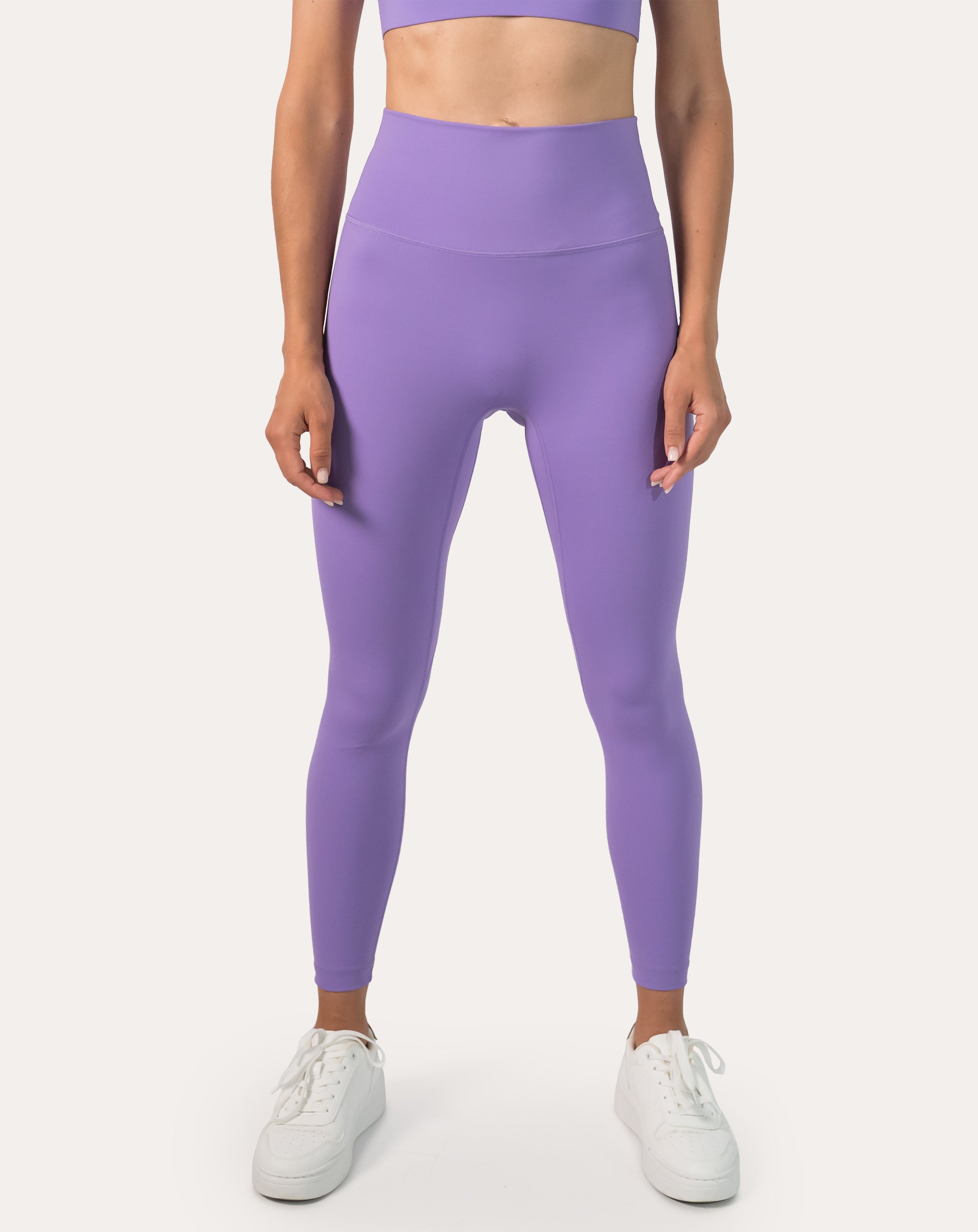 Lilac Pilates leggings with high-waist; front view cropped from torso to ankles