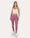 Front view of lilac pocket leggings gym set with contrast-strap longline bra and high-waist leggings.