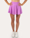 Front close-up of lilac tennis skirt with shorts, high-rise waistband and scalloped hem