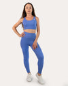 Sapphire blue matching gym set, full front view of racerback bra and high-waist leggings