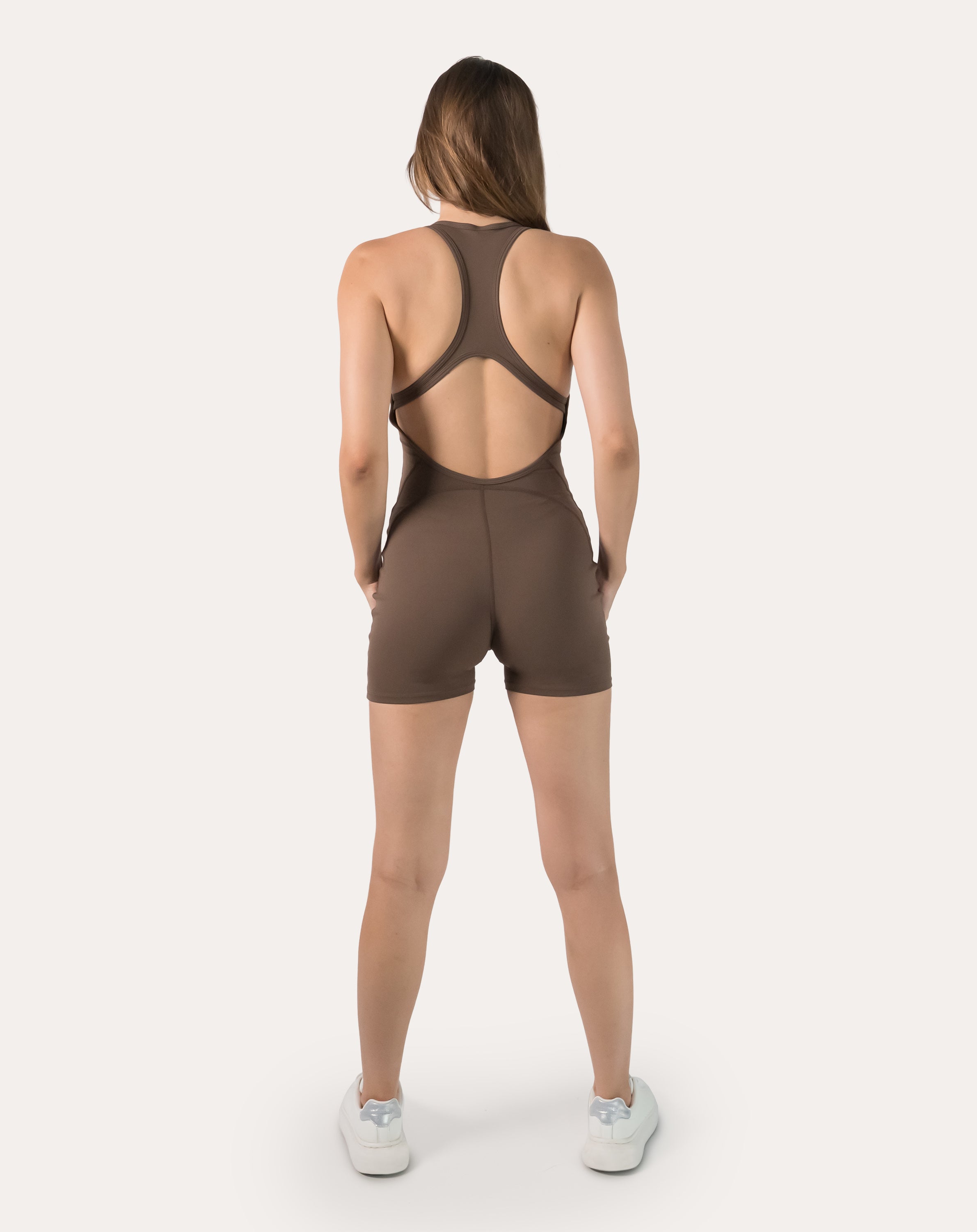 Mocha brown women’s sportswear jumpsuit with racerback; full-length back view