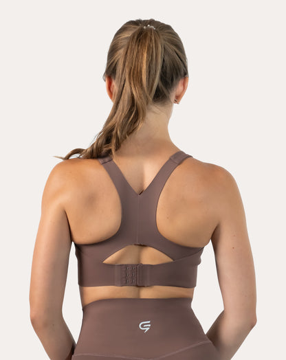 Close-up of mocha gym set bra back showing adjustable clasp and racerback