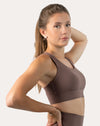 Mocha running bra side profile highlighting wide straps and supportive underband