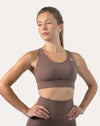 Mocha running bra in three-quarter front pose with scoop neckline and stabilising band