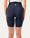 Back close-up of navy high-waist biker shorts with supportive waistband and seams