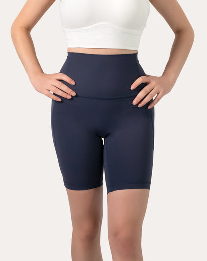 Front close-up of navy high-waist biker shorts with smooth quick-dry knit