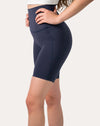 Right side close-up showing phone pocket on navy high-waist biker shorts