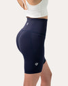 Back left three-quarter close-up of navy biker shorts with high waist and side phone pocket