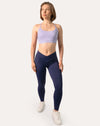 Navy scrunch bum leggings with crossover V-waist; front full-length view