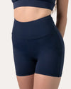 Front close-up of navy sports shorts with high waist and smooth, quick-dry knit