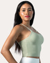 Sage green open back gym top, three-quarter front view with square neck