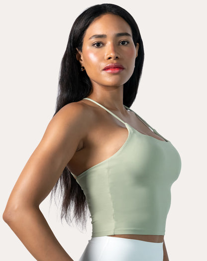 Sage green open back gym top, three-quarter front view with square neck