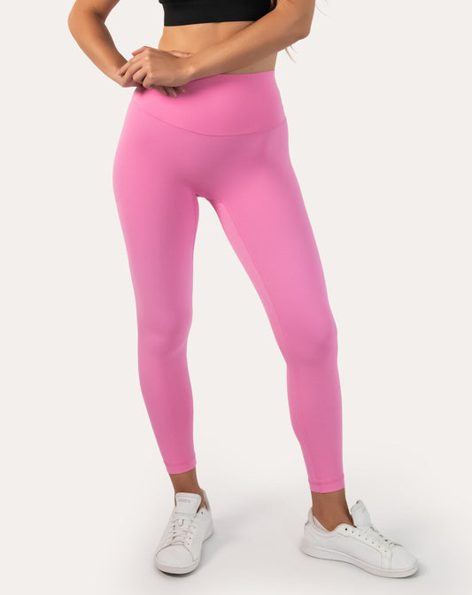 Pink compression leggings with high-waist; left three quarter view