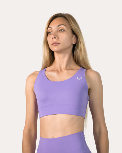 Straight front view of purple sports bra with smooth scoop neck and wide underband