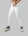 White gym leggings with high waist, ankle length; left three quarter view in a step stance