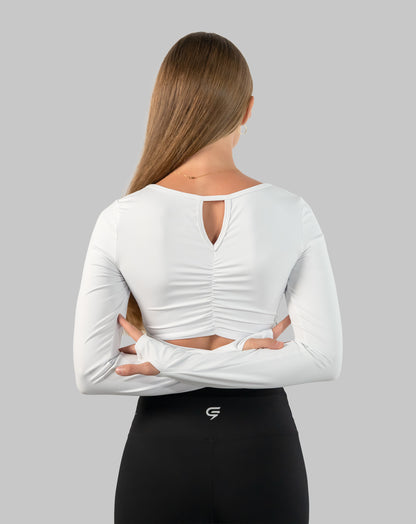 White gym top back view highlighting ruched spine and back keyhole cut-out