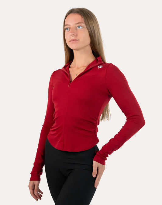 Crimson running jacket for women, full zip-up with stand collar, front right three-quarter view