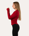 Crimson running jacket for women, right side profile highlighting slim fit and long sleeves