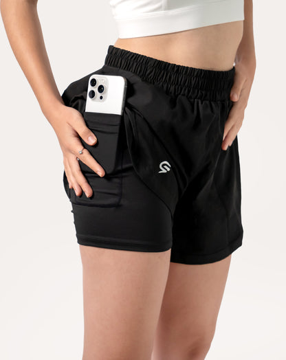 Side detail showing the phone pocket in the liner of black women's 2-in-1 running shorts