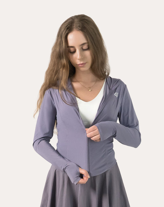 Lavender women’s fitness jacket, front view while adjusting the full zip